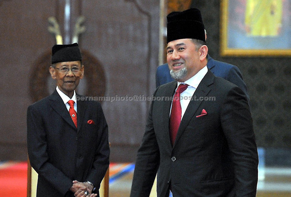 Tuanku Abdul Halim Mu’adzam Shah (left) and Sultan Muhammad V at Istana Negara in Kuala Lumpur yesterday. — Bernama photo