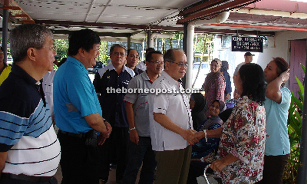 Uggah, dubbed the ‘Knight of the Sight’, speaking to a patient at the recent 6th Betong Cataract Camp held on Aug 12-13 at Betong Hospital. Uggah sponsored the camp for the sixth consecutive time.