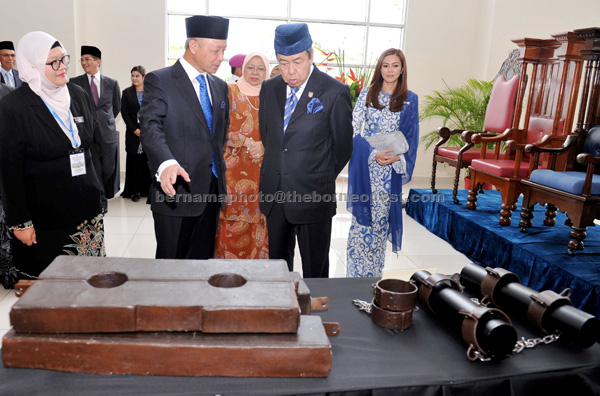 Sultan Sharafuddin (second right) and Tengku Permaisuri Norashikin (right) listening to a briefing on exhibits after opening the new Klang Court building in Selangor. — Bernama photo