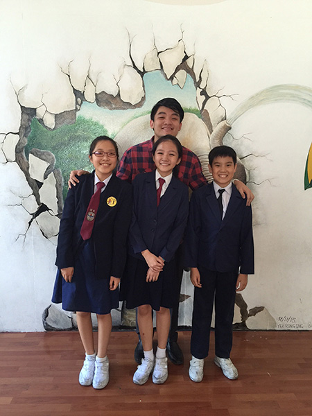 (front row from left) Emanuelle, Shana and Joshua together with their coach, Abel.