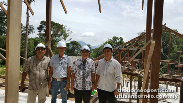 Minos (second right) with the contractor and JKR staff at the project site recently.