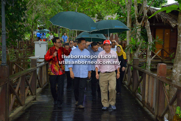 Rahman and John Nip, CEO of SMR Aquaculture Sdn Bhd (right) at Sipadan Mangrove Resort.