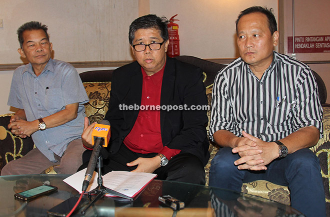 Kong (right) with Ong (centre) and Usop at the press conference. — Photo by Harry Ilias