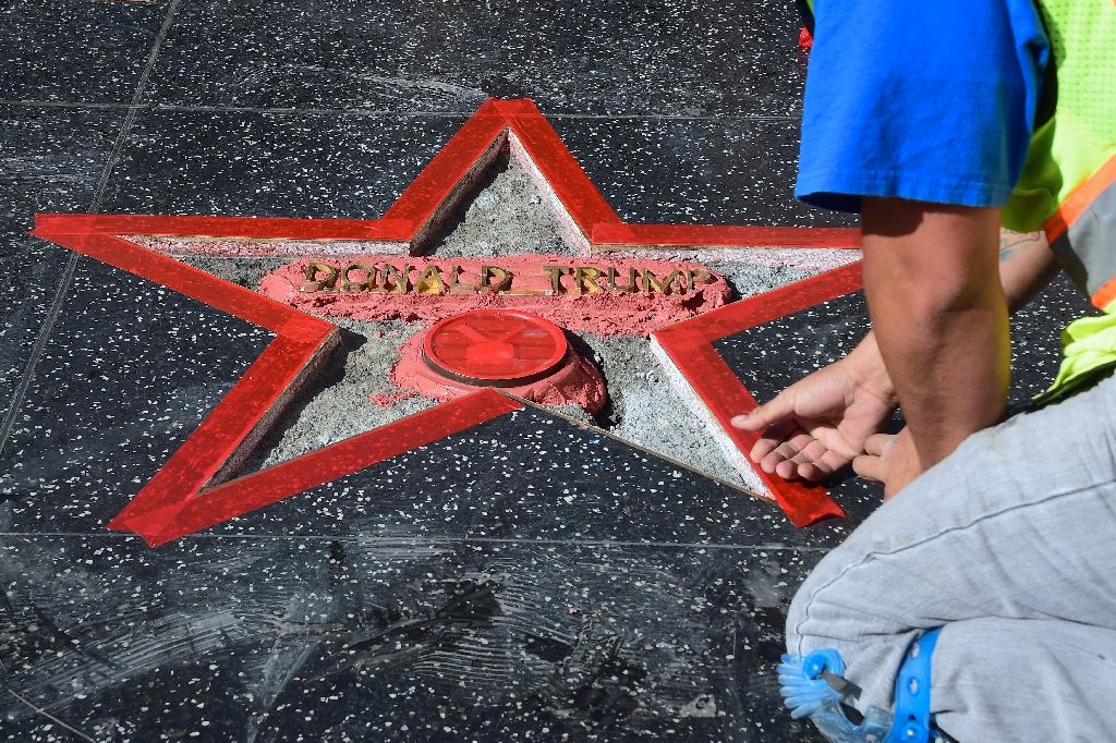 Donald Trump's vandalized Star along the Hollywood Walk of Fame is repaired on Oct 26, 2016. AFP Photo