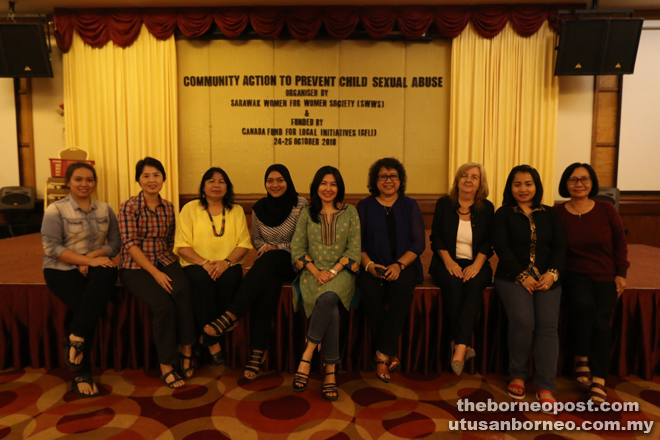 (From fourth left) Training and education executive of PS The Children, Farah Ilyia Fauzi; Yong, SWWS president Margaret Bedus, Raja and others after the workshop.