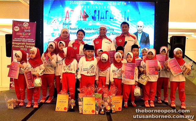 Abu Hassan (second from right) with contestants from Smart Reader Kids Jalan Rubber Barat and Smart Reader Kids Taman Yen Yen, Matang. 