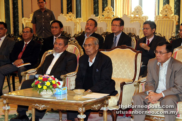 Adenan (centre), flanked by Morshidi (left) and Dr Rundi, and with other assemblymen and senior government officials watch the live telecast. — Photo by Chimon Upon