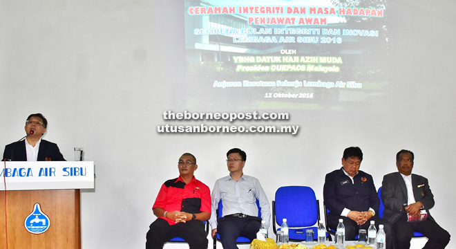 Azih (left) speaks during the ‘Integrity and Civil Service Future’ talk. 