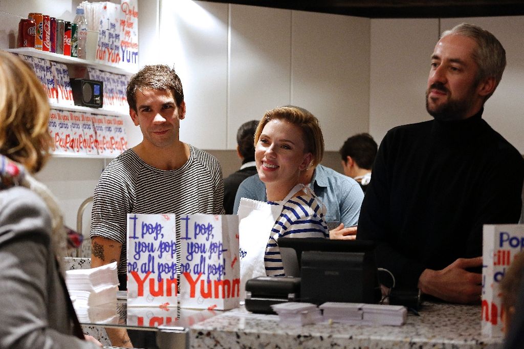 US actress Scarlett Johansson and her husband Romain Dauriac (L) attend the opening of the Yummy Pop gourmet popcorn shop in the Marais district of Paris on Oct 22, 2016. AFP Photo