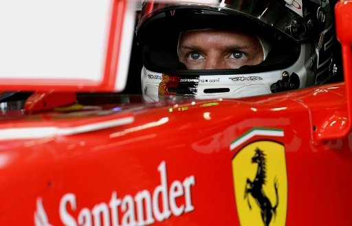 Sebastian Vettel started from the third row of the grid but was touched by the Red Bull of Max Verstappen catapulting his front wheel into Nico Rosberg, causing the Mercedes driver to spin. AFP Photo