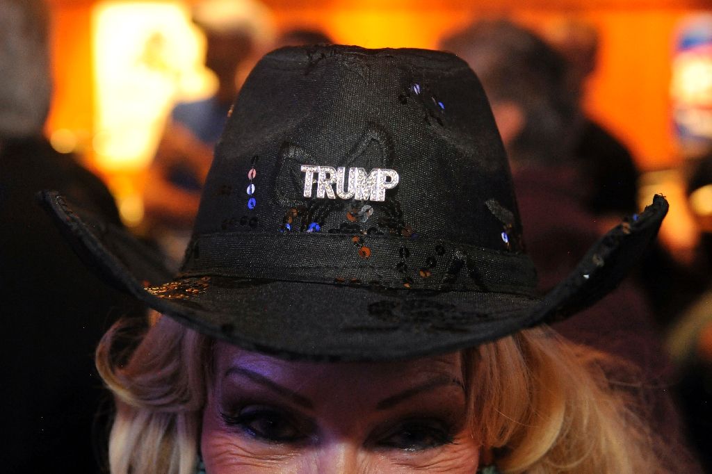 A Trump supporter sports a hat bearing his name. AFP Photo