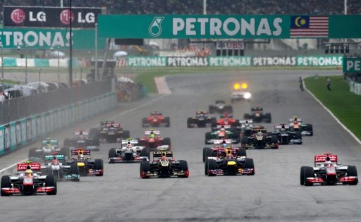 Dan Martin | Formula One cars accelerate at the start of the Malaysian grand Prix in Sepang -AFP photo