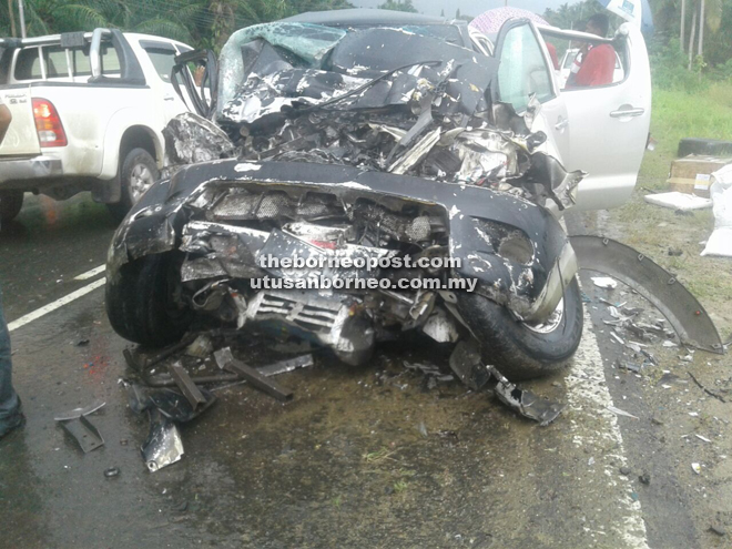 The badly damaged Toyota Vigo pick-up truck after colliding head-on with the lorry.