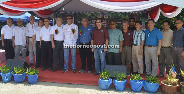 Sam Mannan (seventh left) flanked by Law Hui Kong (sixth left) and Prof Dr Sharil Yusof during the launching ceremony of the camp at Segaliud Lokan Forest Reserve.