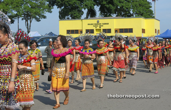 Iban women participants dressed to the hilt in authentic costume.