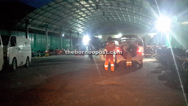 Petronas workers arriving at a private jetty in Kampung Pulau Melayu, Miri around 5Aam yesterday.