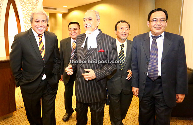 Awang Tengah (left) sharing a light moment with State Legislative Assembly Speaker Datuk Amar Mohd Asfia Awang Nassar (third left) as well as former assemblymen (from second left) Abu Seman Jahwie, Datuk Dr Wahbi Junaidi and Datuk Awang Bemee Pengiran Ali Basah after the DUN sitting yesterday.