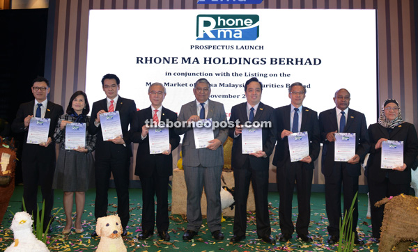 Fong (fourth left) and other board members of Rhone Ma and Public Investment Bank Bhd during their prospectus launch yesterday. 