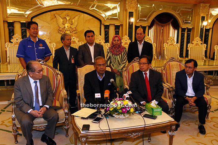 Adenan fielding questions from reporters. Also seen are (seated from left) Uggah, Abang Johari and Dr Rundi. The five elected representatives are (standing from left) Ilus, Paulus, Gerawat, Rosey and Miro. — Photo by Kong Jun Liung