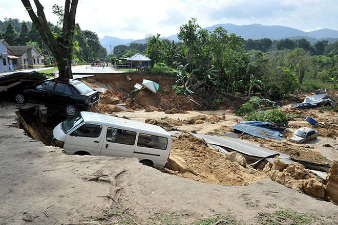 The aftermath of the landslide at Taman Idaman yesterday. — Bernama photo