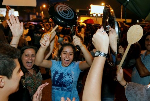 Cuban Americans celebrate news of Fidel Castro's death in Little Havana neighborhood of Miami, Florida on November 26, 2016. AFP/Leila Macor