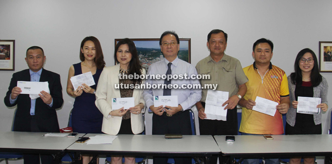 From left, Chali, Yap, Dolly, Liaw, Wong, Shim and Ho during the lucky draw. 