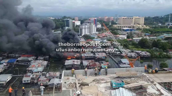 The five wooden houses at Kampung Sembulan Lama that were destroyed in the fire yesterday.