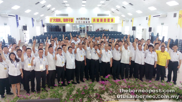 Ting (holding a microphone) and others at the opening ceremony of the Youth Annual Delegates Conference yesterday.