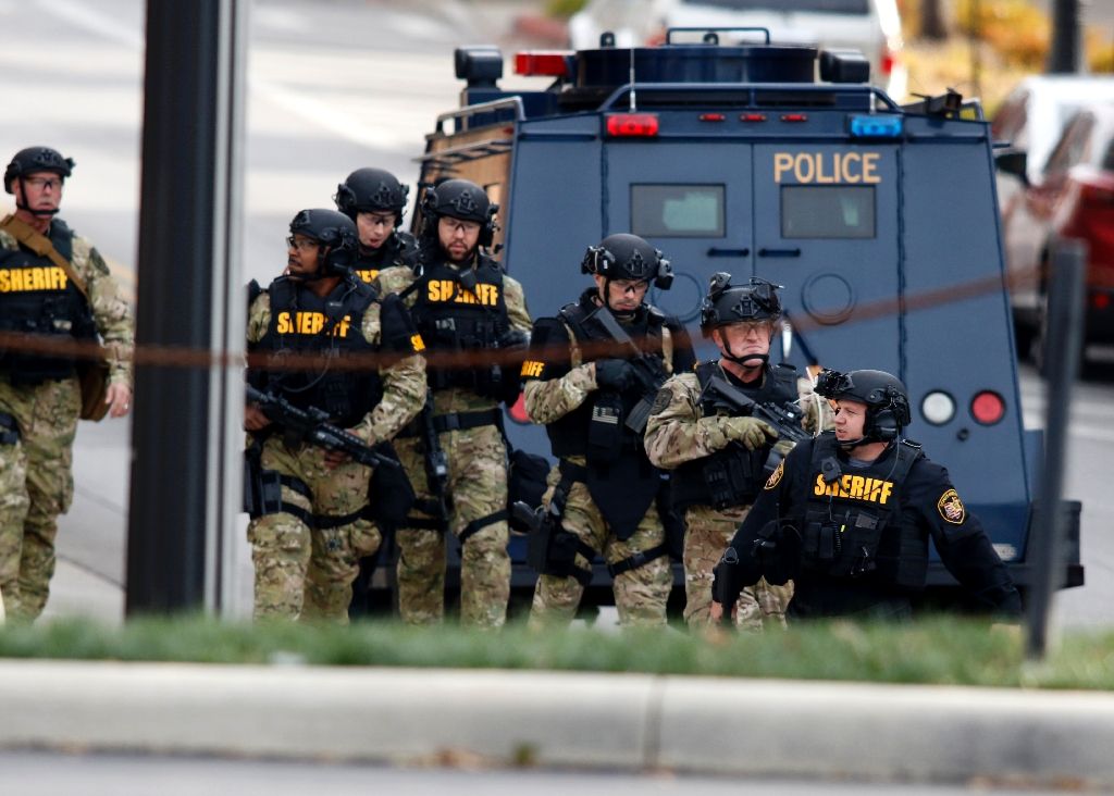 Law enforcement officials are seen outside of a parking garage on the campus of Ohio State University as they respond to an attack in Columbus, Ohio, on Nov 28, 2016. AFP Photo