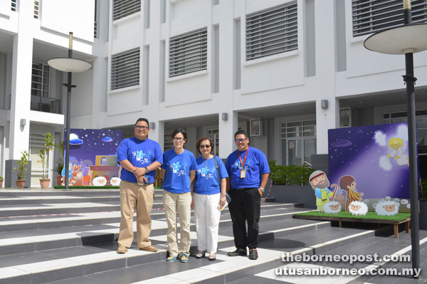 Ying (left) and three of his organising committee members at Hoover Square. On his left are Pastor Monica  Siew Yu Jinn and Kapitan Wong Hui Ching.