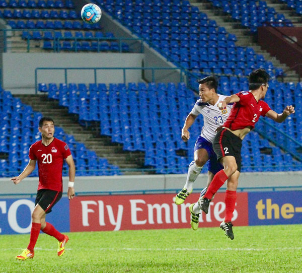 Xaisongkham (centre) of Laos scores in the 83rd minute during the Group B match of the AFC Solidarity Cup against Mongolia at Sarawak Stadium on Wednesday night.