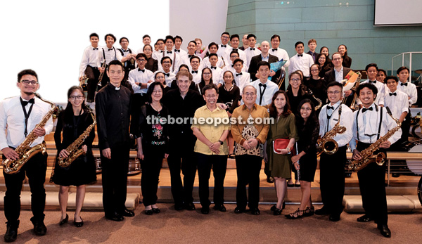 Uggah and Dr Sim (front, fifth right and centre, respectively) with members of the organising committee and performers of ‘A Brass Spectacular’ at Trinity Methodist Church Kuching. Also in the group photo are Ling and Fox (fourth and fifth left, respectively). 