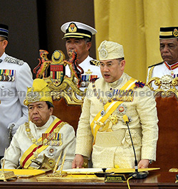 Sultan Muhammad V taking his oath as the 15th Yang di-Pertuan at the 244th (Special) Meeting of the Conference of Rulers chaired by Sultan of Selangor Sultan Sharafuddin Idris Shah (seated left). — Bernama photos