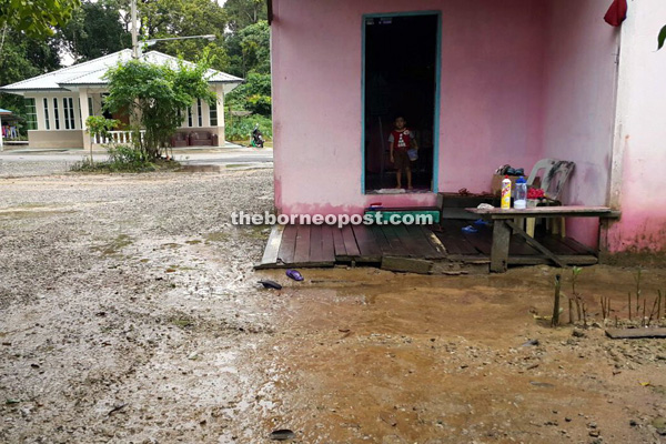 One of the houses at Kampung Temaga Melayu affected by the flash flood which receded around 1pm yesterday.