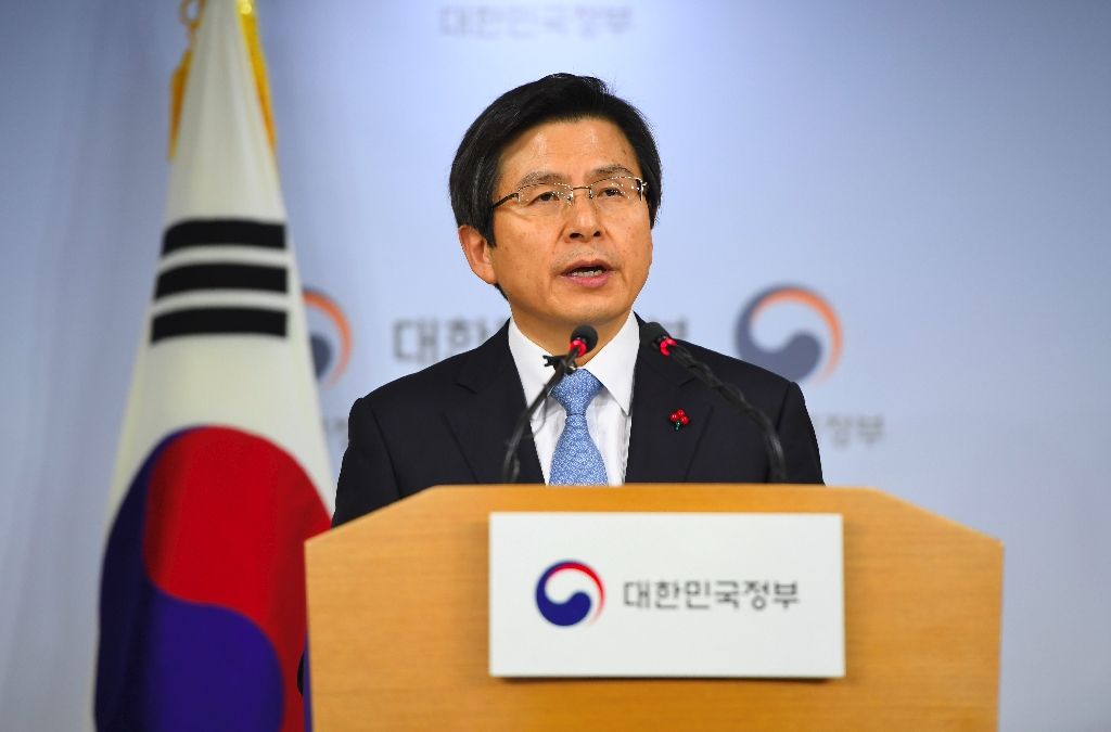 South Korea's Prime Minister and acting President Hwang Kyo-Ahn delivers a public address at the government complex in Seoul on December 9, 2016 after parliament passed a motion of impeachment against President Park Geun-Hye. AFP Photo