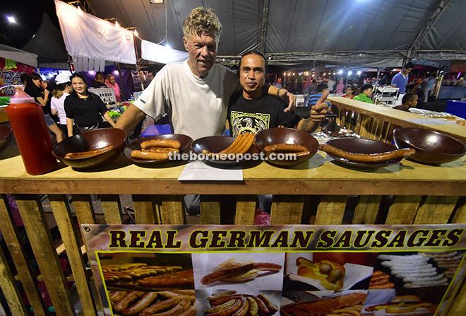 Rudi Welssmann (left) from Germany together with a local Tony Tajul proudly introducing their awesome delicious ‘Real German Sausages’