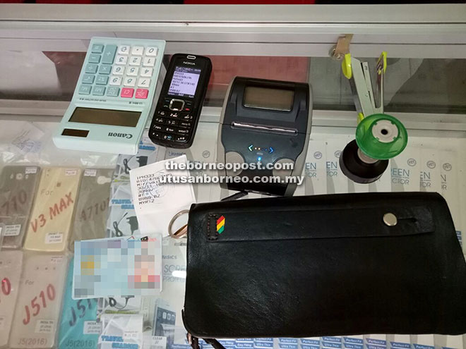 Photo shows the illegal lottery-related items seized by police from the kiosk.