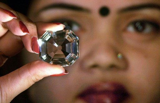 A replica of the Koh-i-noor diamond, the gem's blood-soaked history is related in a new book by William Dalyrmple and Anita Anand. AFP File Photo