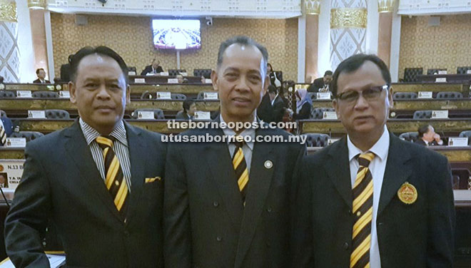 Penguang (centre), Henry (left) and Rolland in the State Legislative Assembly building.