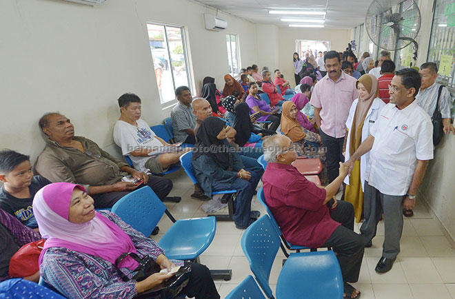 Subramaniam greets visitors during his visit to the Puchong Health Clinic. — Bernama photo