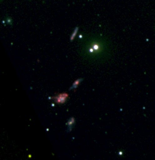 NATURE PUBLISHING GROUP/AFP / by Marlowe HOOD | An optical image of one of the isolated galaxy groups observed with the Magellan Telescope in Chile -AFP photo