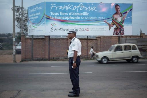 A Malagasy traffic policeman directs the traffic on the outskirts of Antananarivo on November 24, 2016 -AFP photo
