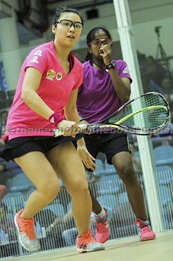 Delia Arnold (left) and Rachel Arnold plays in the women’s double during the National Open Squash Championshihps in this file photo. — Bernama photo