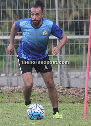 Egyptian Talaat controls the ball during a selection trial.