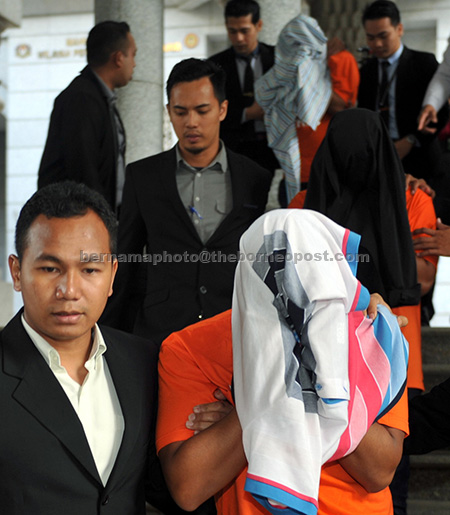 A government ministry secretary-general and his two sons have been remanded for seven days to facilitate investigations into a power abuse and graft case. — Bernama photo