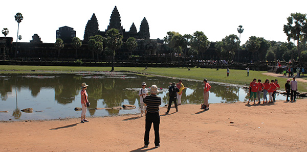 The Angkor Wat – a magnificent monument – in the background.