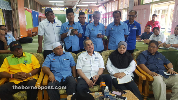Wan Junaidi (seated centre) fields questions from reporters at the press conference. Also seen are Rakayah (seated, second right), Tukimin (seated right) and Rajidin (seated, second left).