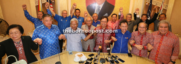 Abang Johari (fourth right) with the  state BN leaders joining arms to show solidarity and suport to develop the state.