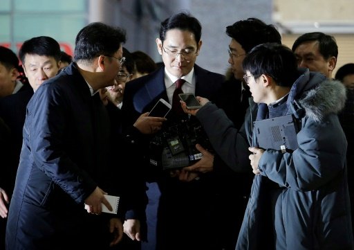 Lee Jae-yong (centre), vice chairman of Samsung Electronics, arrives to be questioned as a suspect in a corruption scandal that led to the impeachment of President Park Geun-Hye, in Seoul, on Jan 12, 2017. AFP File Photo