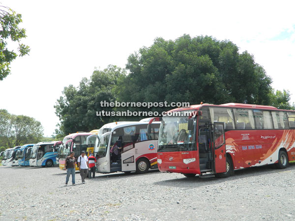 Visitors from Brunei play a critical role in Miri’s economic growth as attested by this scene of rows of buses in front of a shopping complex in Miri.